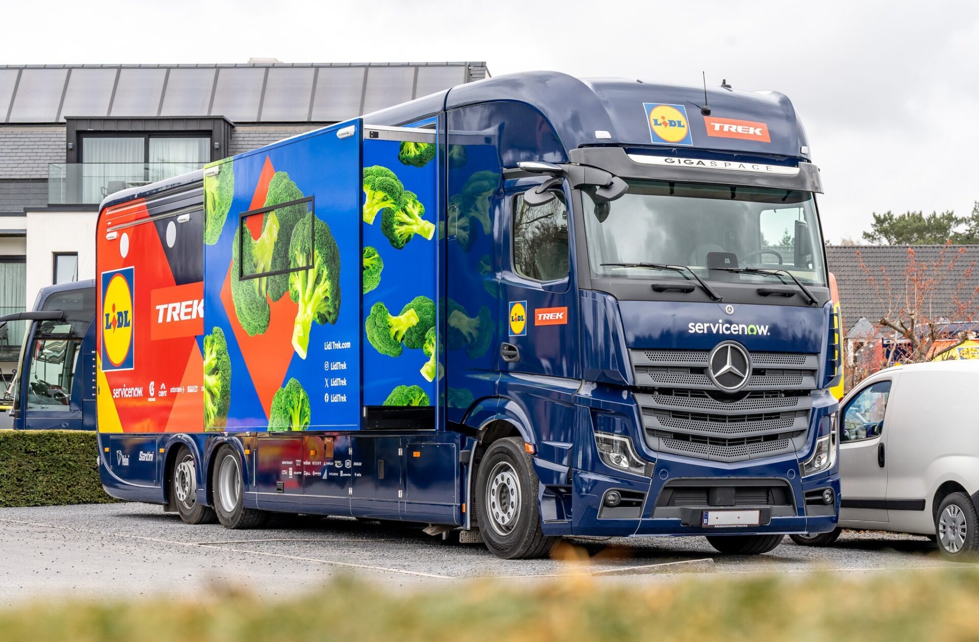 Custom-built Krismar hospitality motorhome for Lidl-Trek with open pop-out.